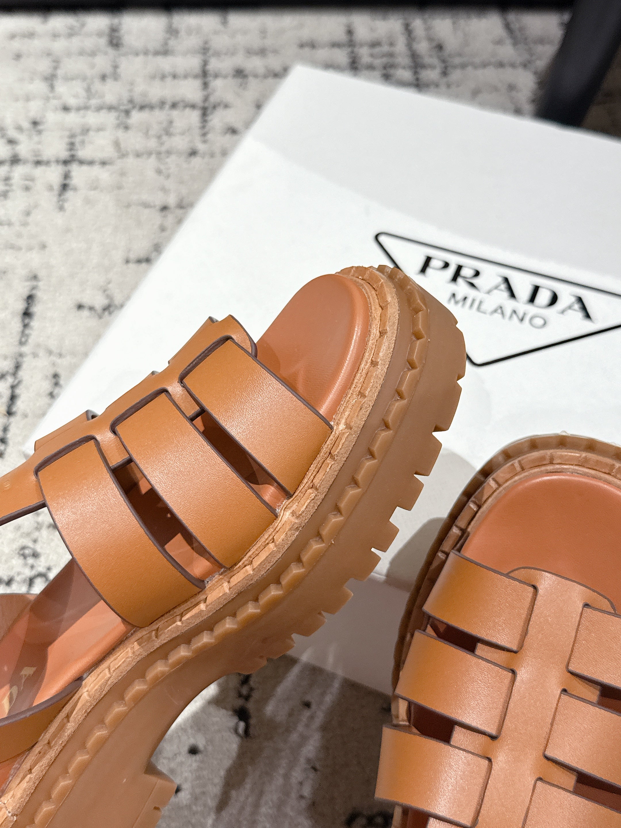 PRADA 25S FISHERMAN OPEN TOE SANLS IN BURNT ORANGE CALFSKIN
