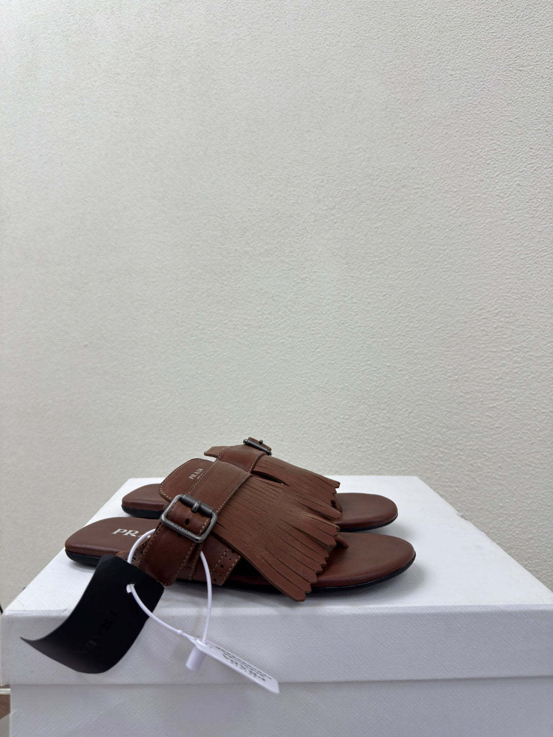 PRADA 25S SHUFFLE LEATHER THONG SANLS IN SIENNA CALFSKIN