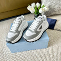 PRADA BLACK THICK SOLE SNEAKER GRAY AND WHITE CALFSKIN
