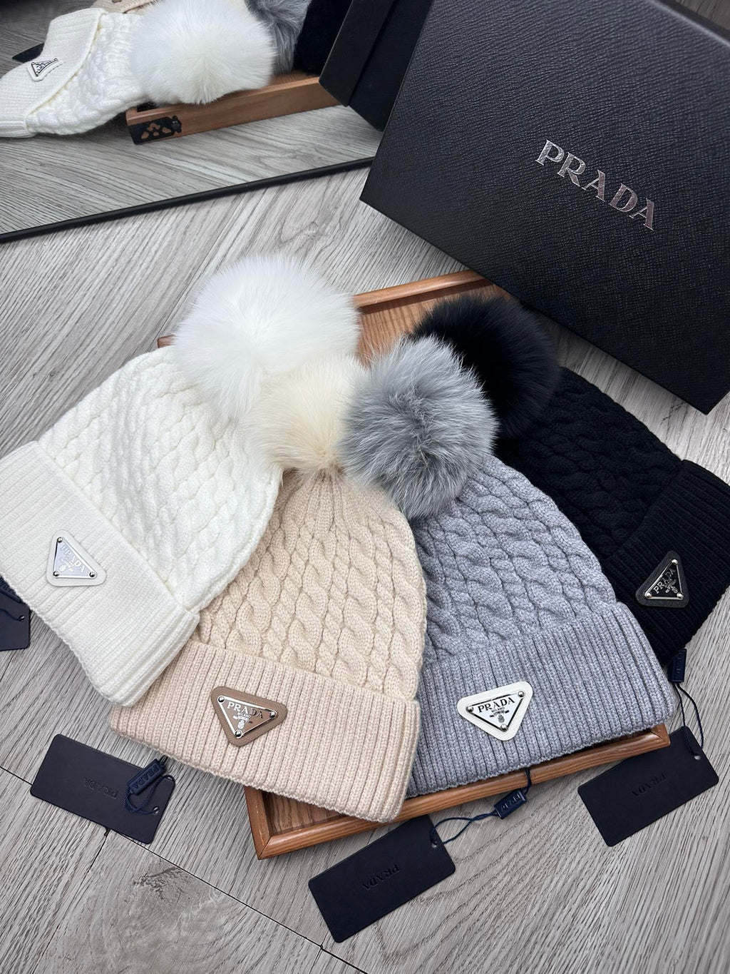 PRADA BEANIE HAT IN BLACK WOOL 352375