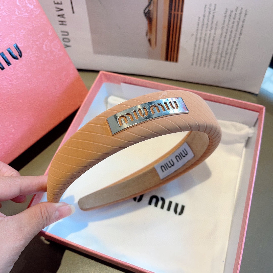 THICK HEADBAND IN BRONZE ORANGE DIAGONAL LEATHER 425479
