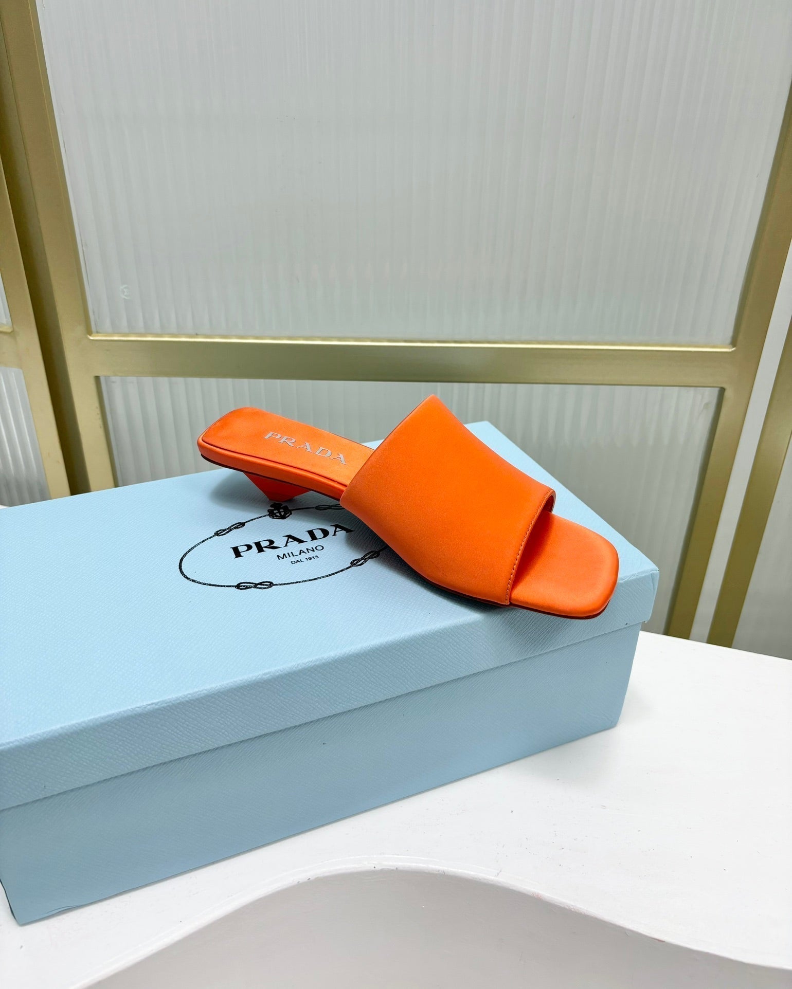 PRADA TRIANGLE HEEL SATIN SLIPPERS BRIGHT ORANGE