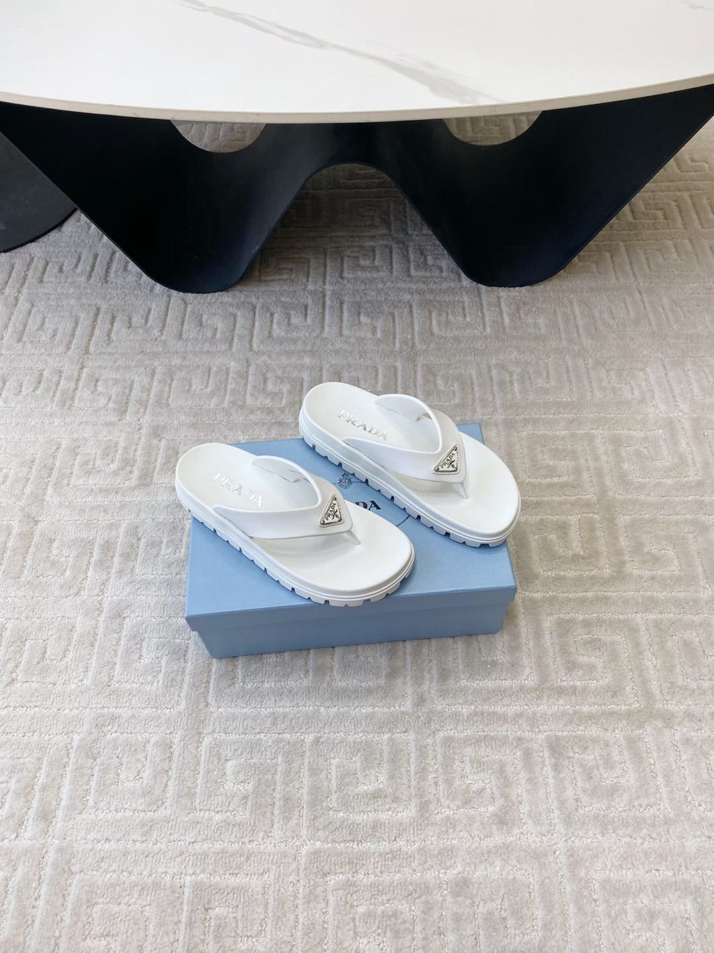 PRADA THICK-SOLED FLIP FLOPS IN WHITE RUBBER