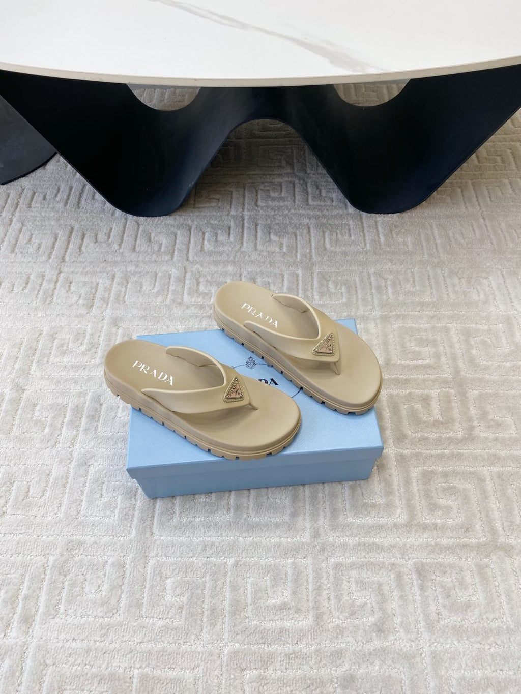 PRADA THICK-SOLED FLIP FLOPS IN ECRU BEIGE RUBBER