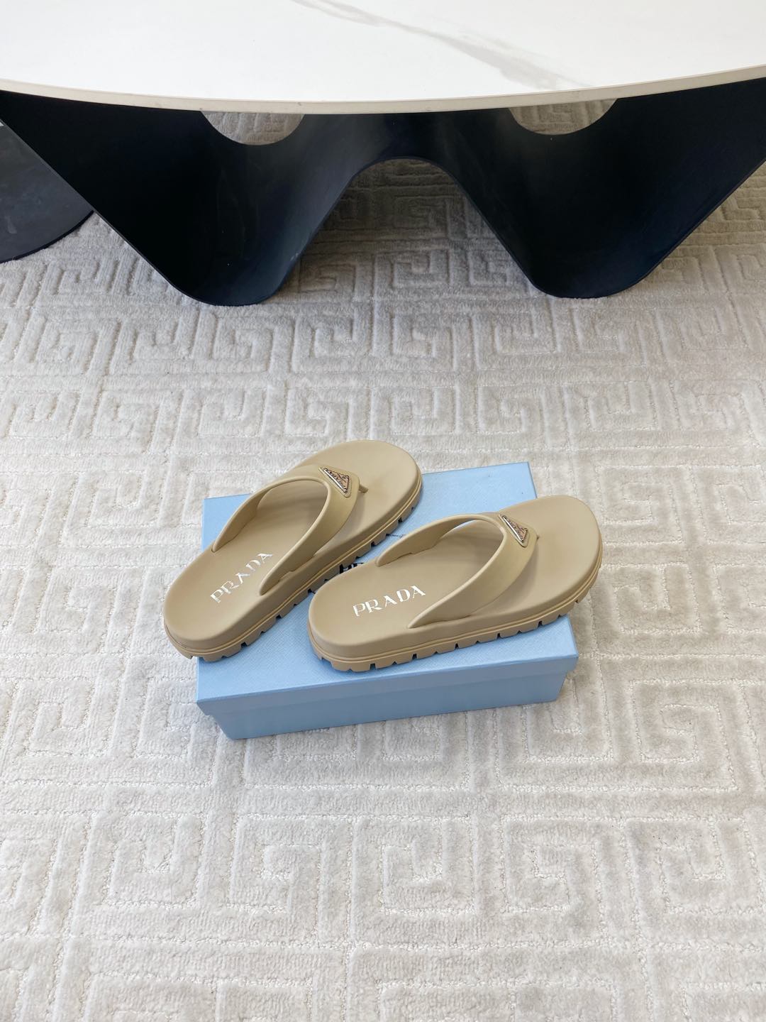 PRADA THICK-SOLED FLIP FLOPS IN ECRU BEIGE RUBBER