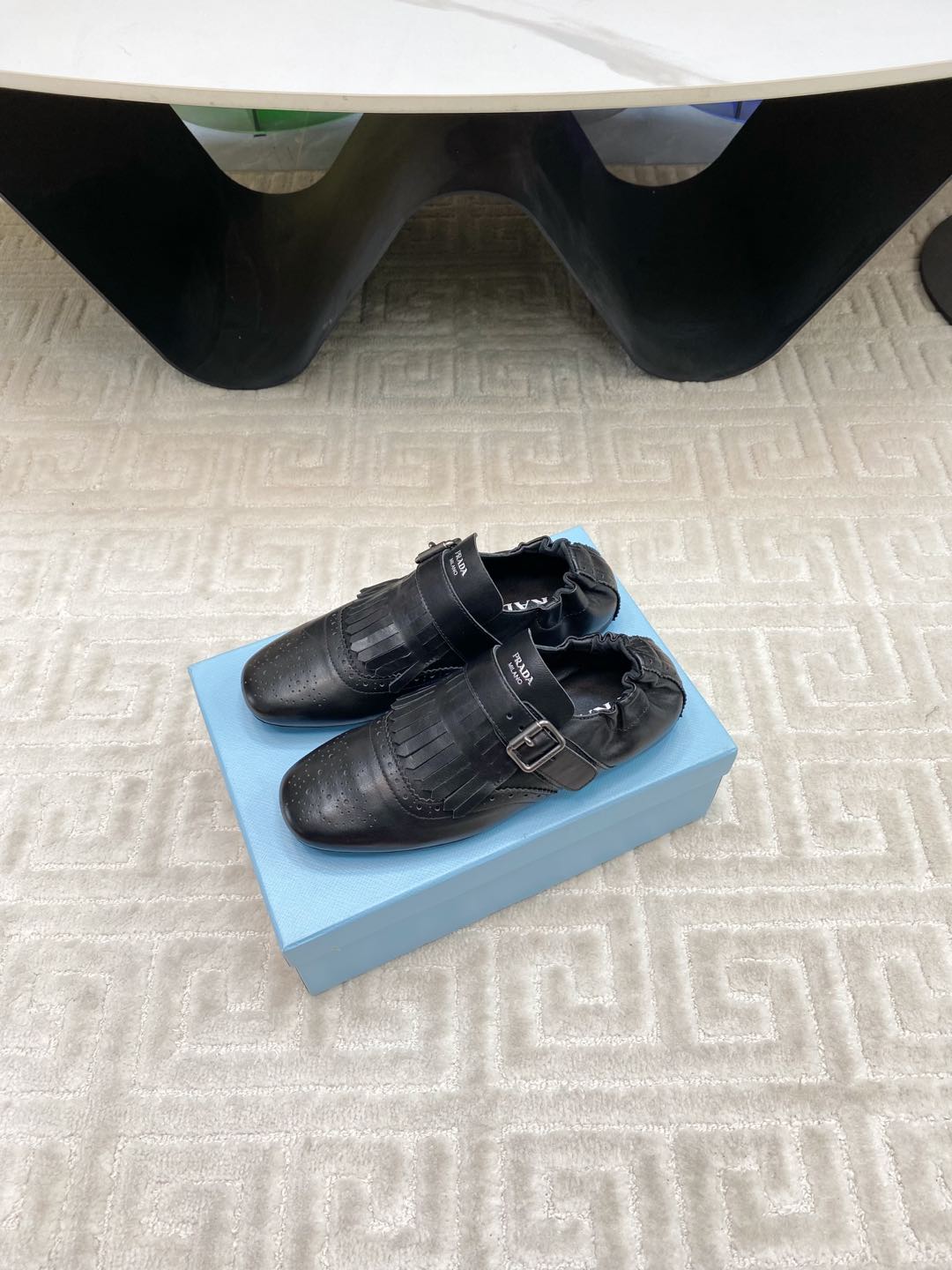 PRADA TASSEL LOAFERS IN BLACK LAMBSKIN