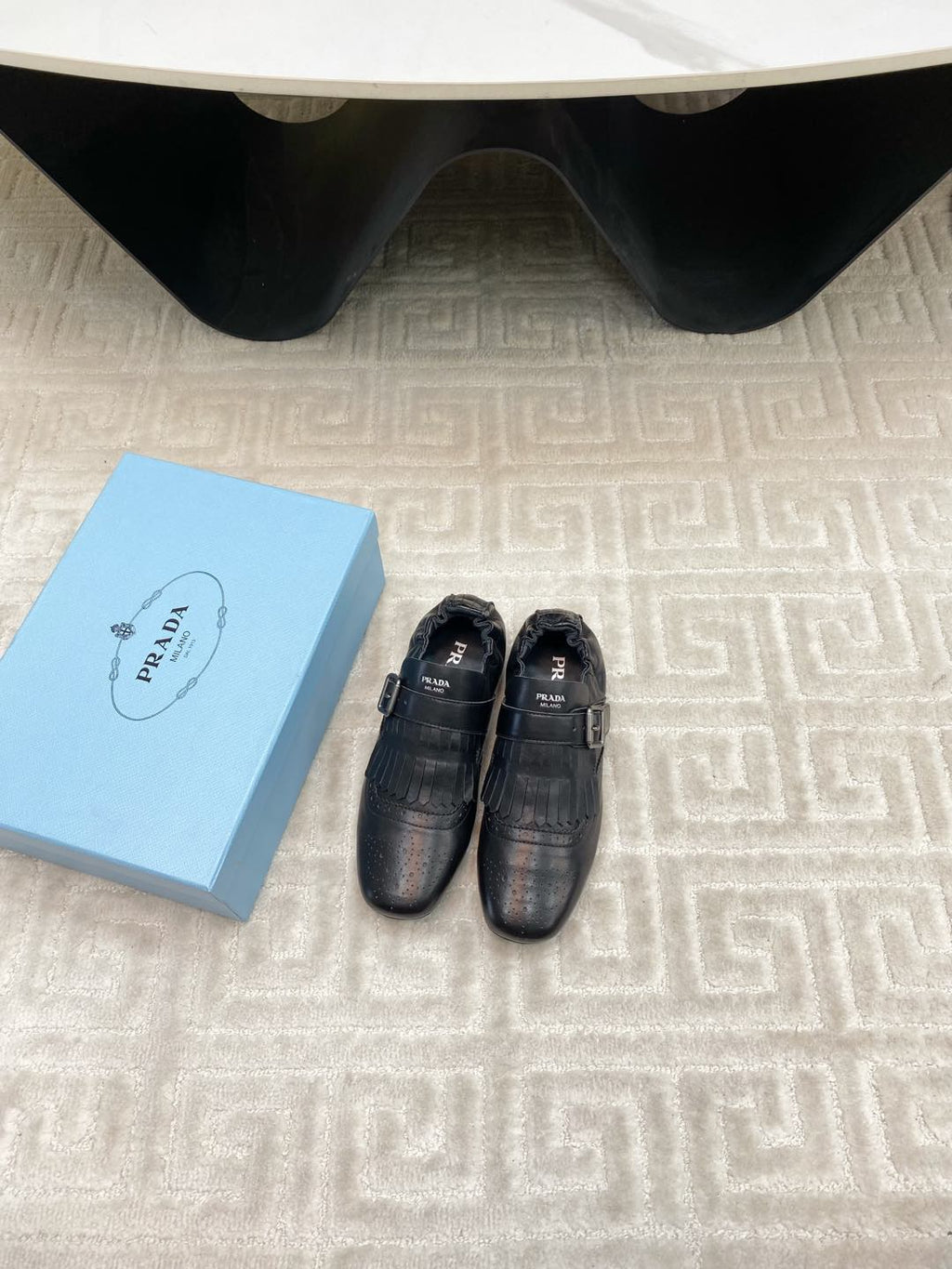 PRADA TASSEL LOAFERS IN BLACK LAMBSKIN