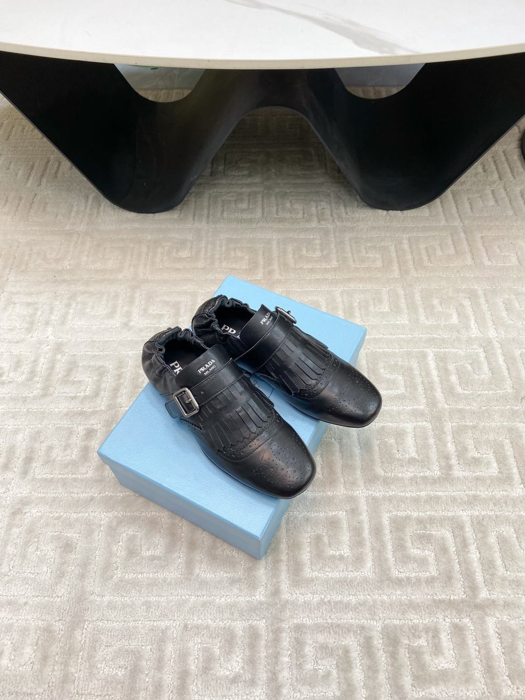 PRADA TASSEL LOAFERS IN BLACK LAMBSKIN