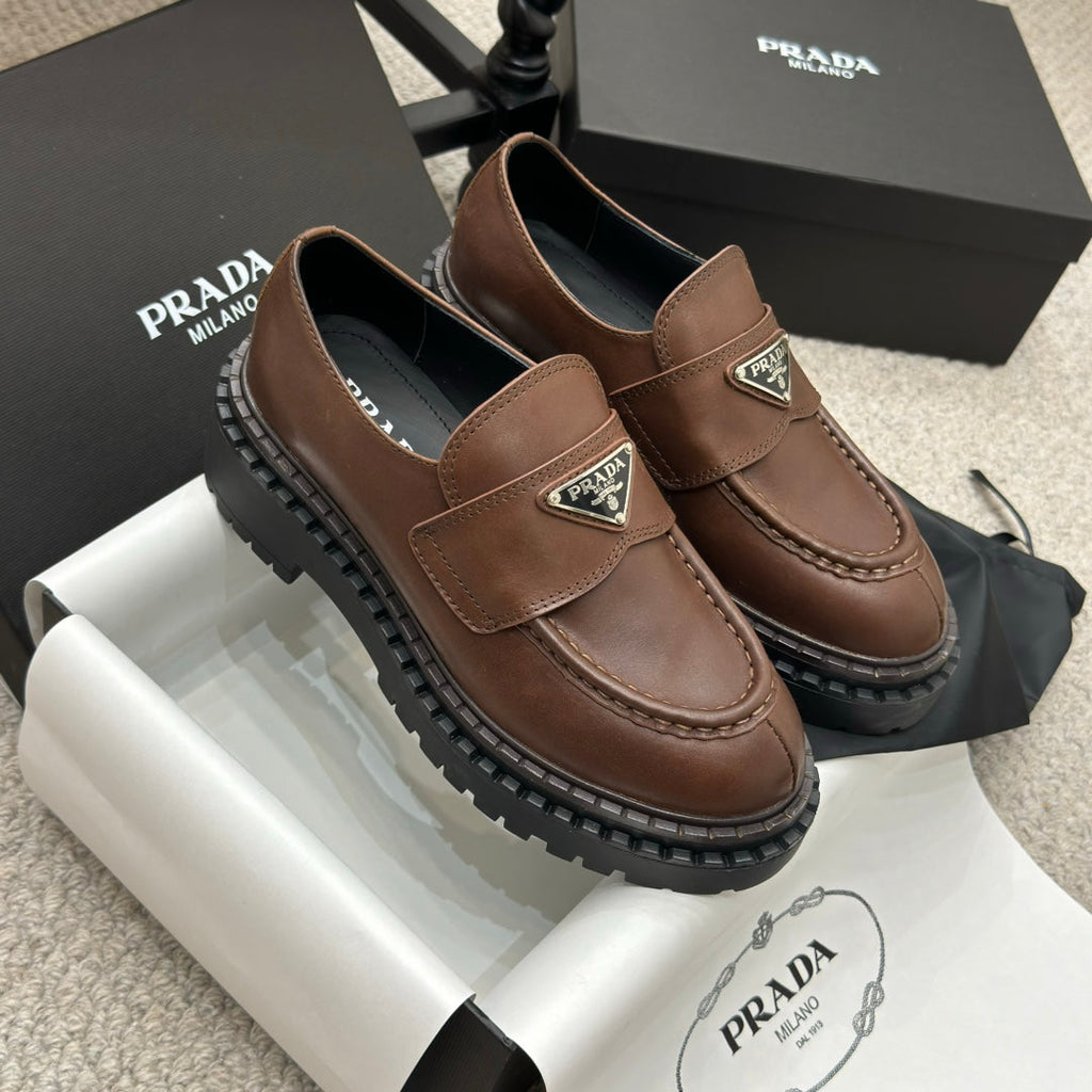 PRADA 25S LOAFER 50MM IN RK BROWN CALFSKIN LOGO