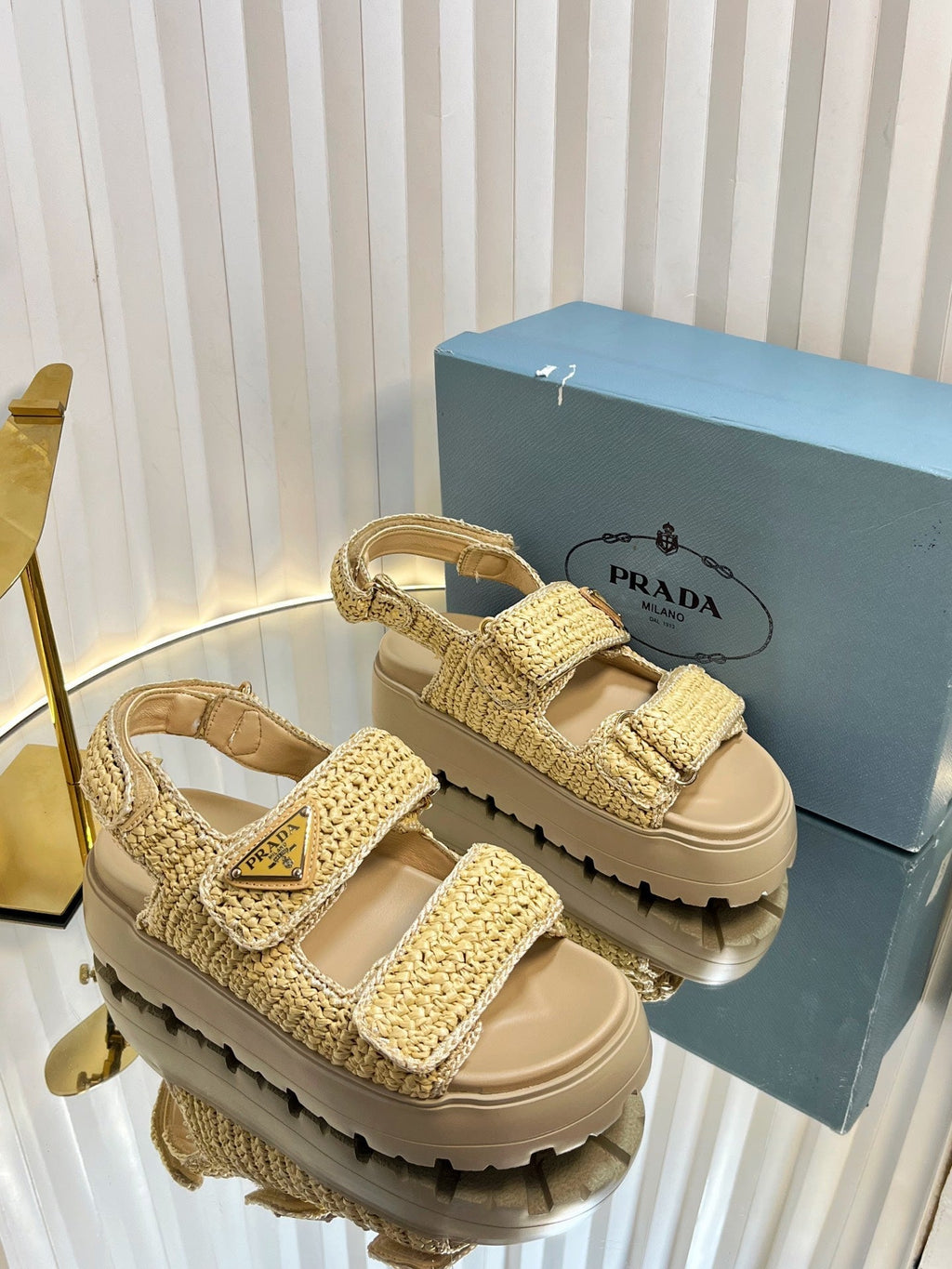 PRADA THICK-SOLED SLIDE IN BEIGE RAFFIA