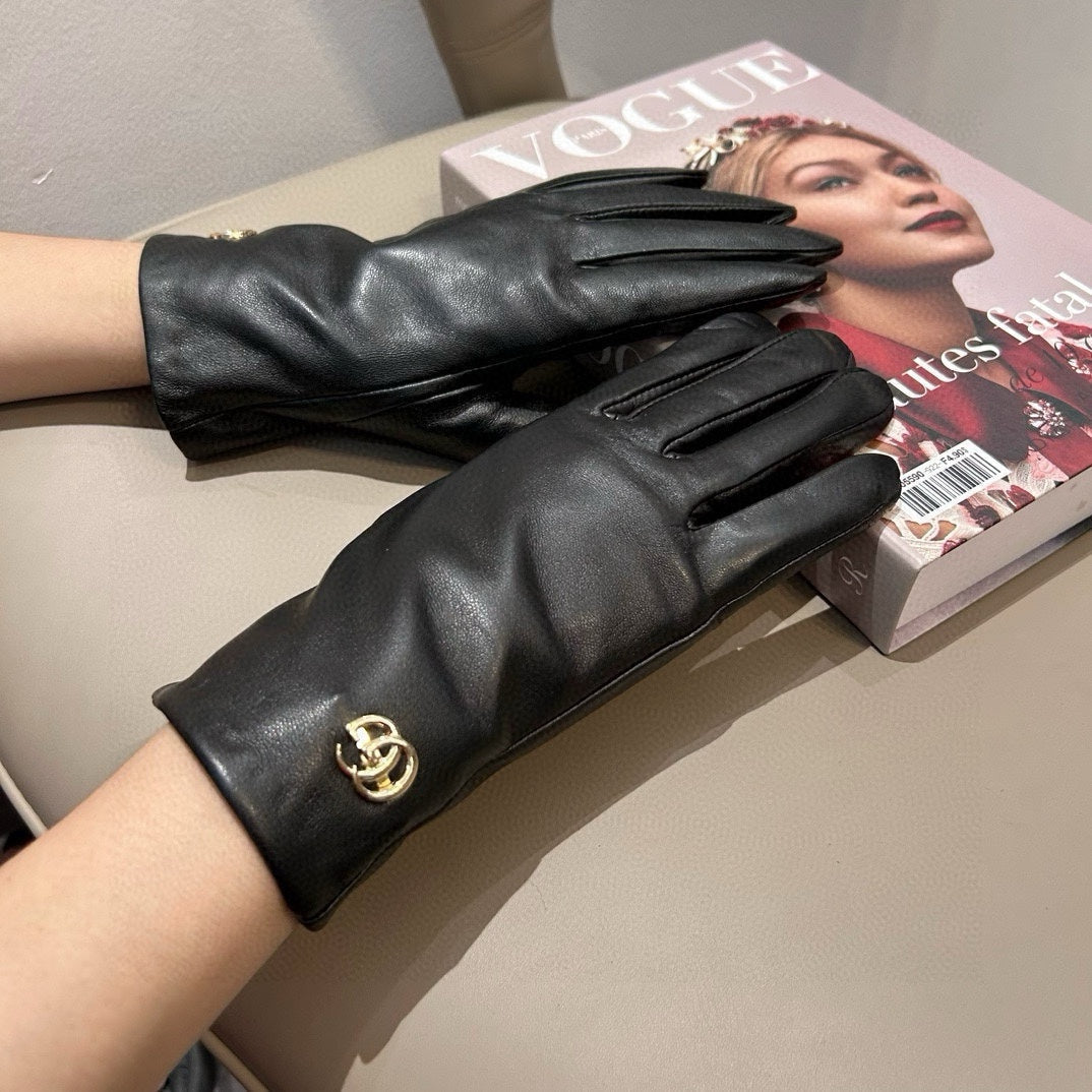 GUCCI TOUCHSCREEN GLOVES IN BLACK LAMBSKIN AND SHEARLING LINING 463863
