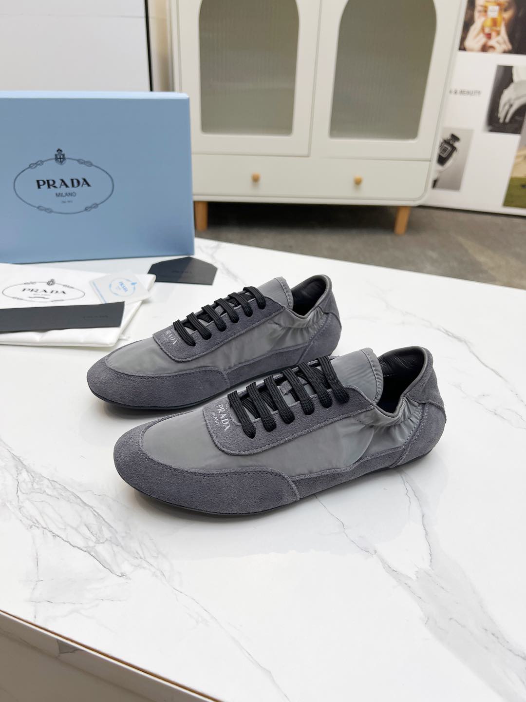 PRADA COLLAPSE SNEAKERS IN GRAY SUEDE AND NYLON
