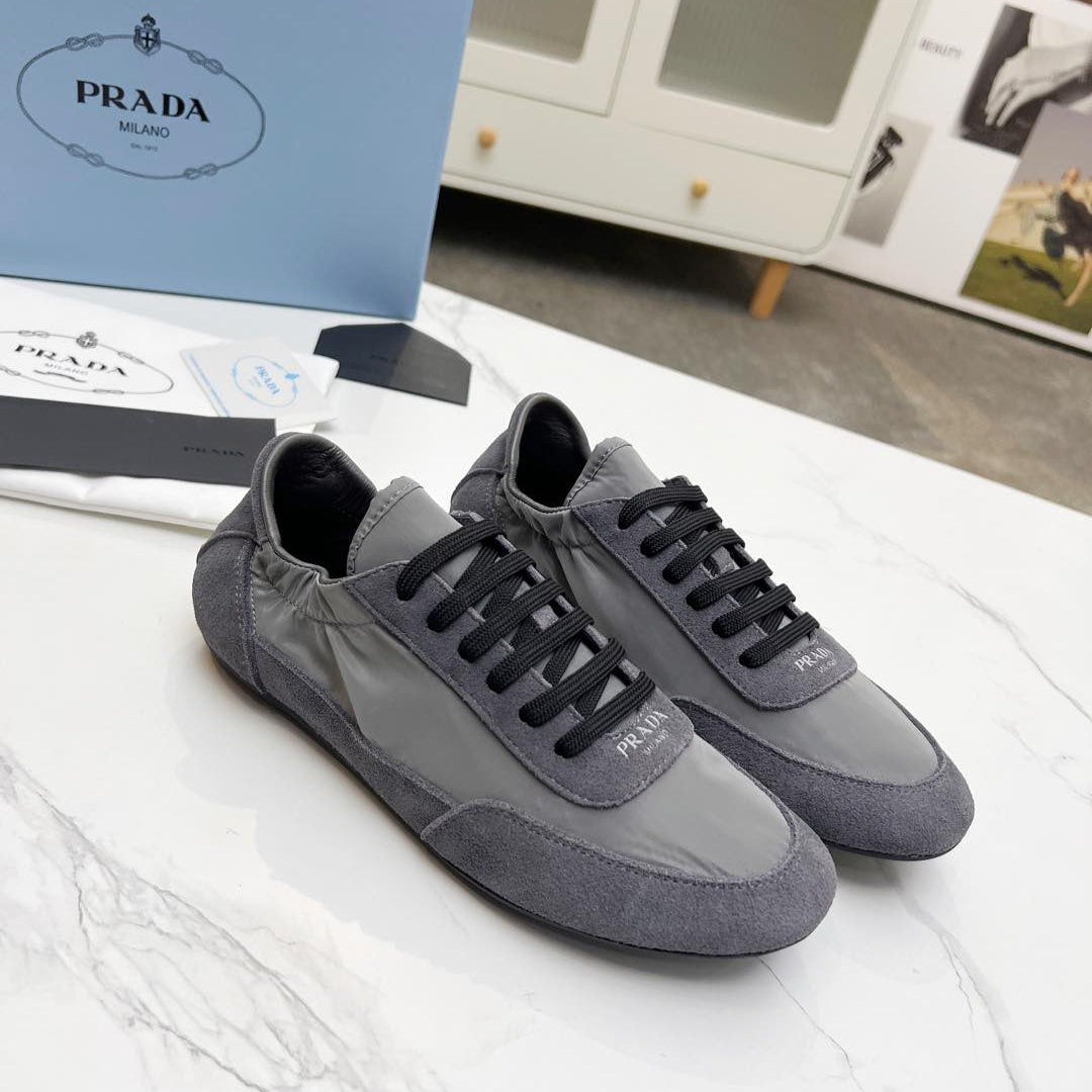PRADA COLLAPSE SNEAKERS IN GRAY SUEDE AND NYLON
