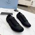 PRADA COLLAPSE SNEAKERS IN BLACK SUEDE AND NYLON