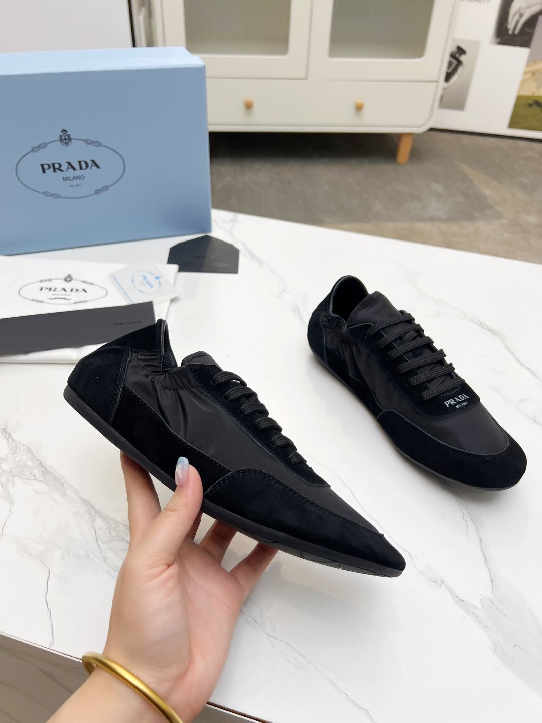 PRADA COLLAPSE SNEAKERS IN BLACK SUEDE AND NYLON