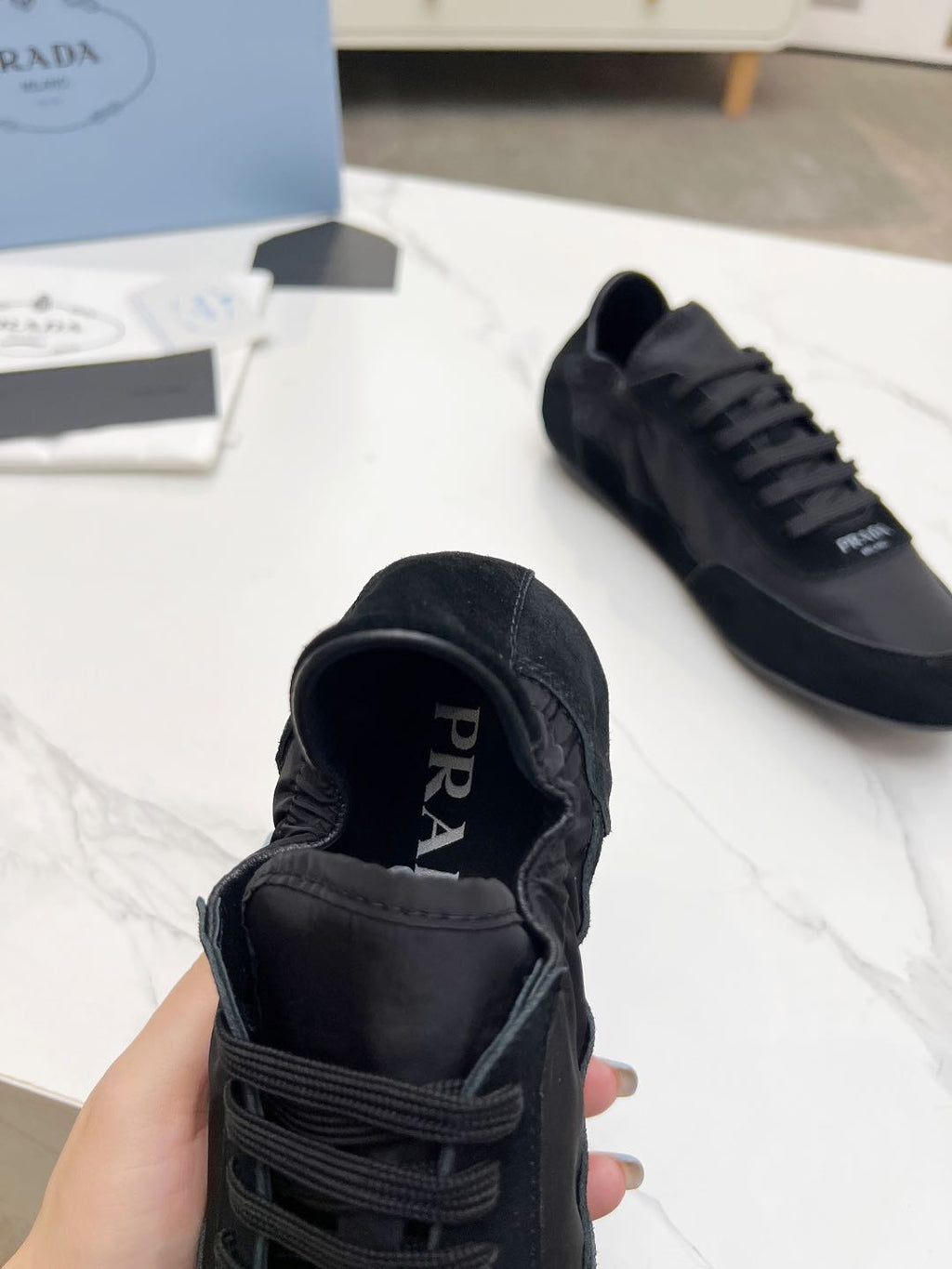 PRADA COLLAPSE SNEAKERS IN BLACK SUEDE AND NYLON