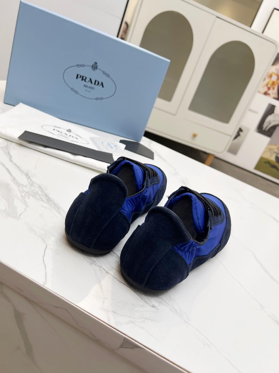 PRADA COLLAPSE SNEAKERS IN BLUE SUEDE AND NYLON