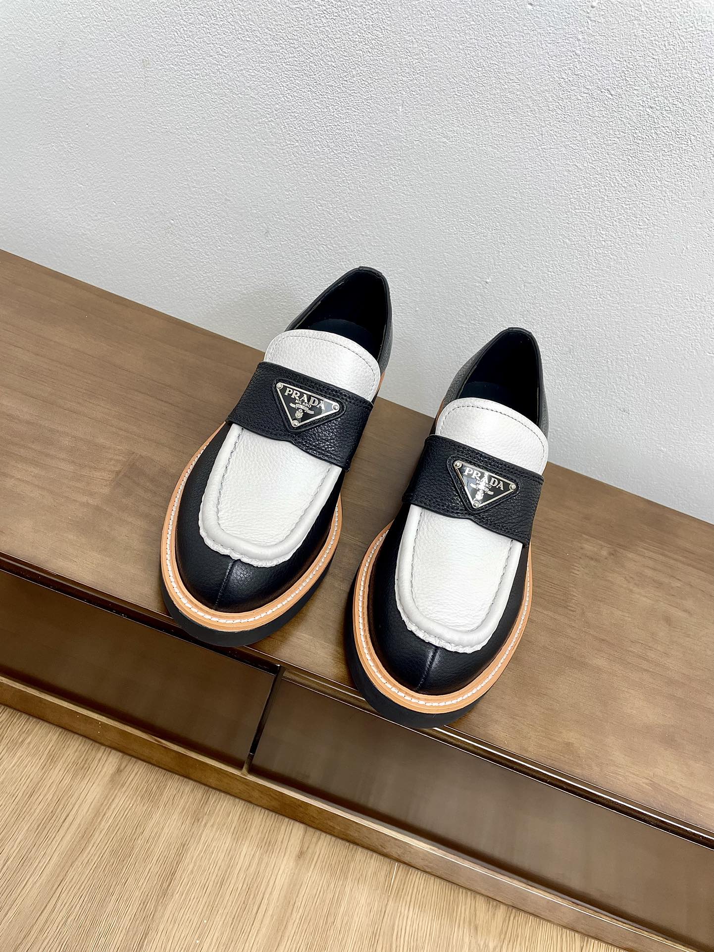 PRADA CHOCOLATE LOAFERS BLACK AND WHITE CALFSKIN