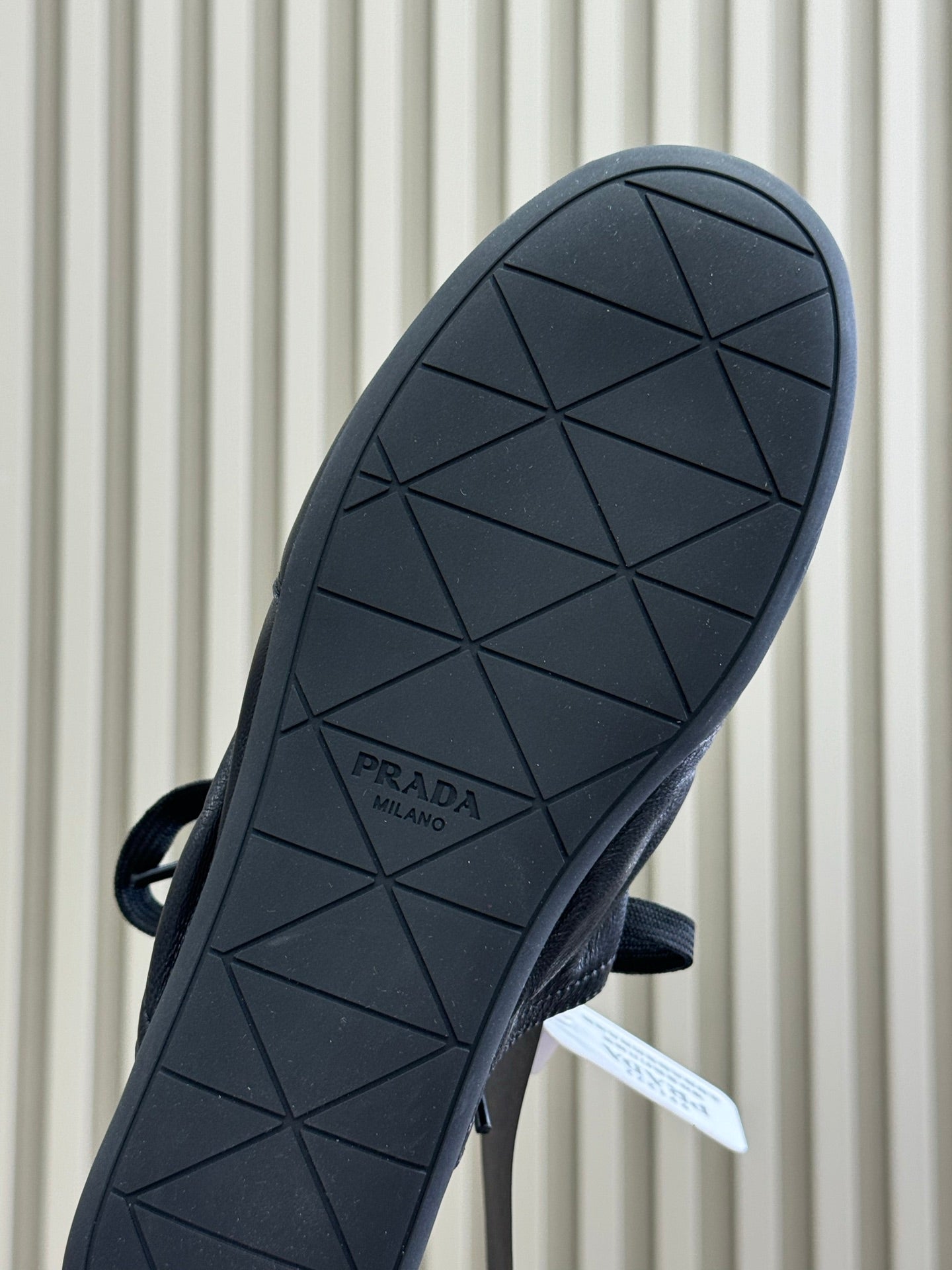 PRADA 25S COLLAPSE MULES IN BLACK CALFSKIN