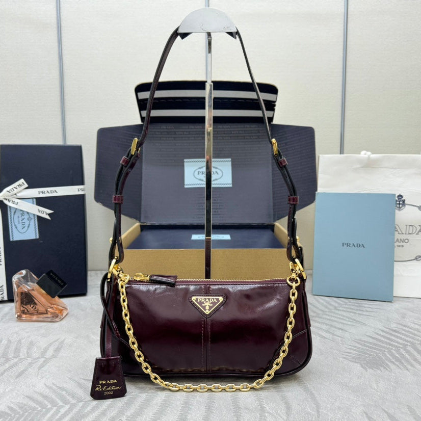PRADA 25S RE-EDITION 2002 MEDIUM SHOULDER BAG 26 IN BURGUNDY CALFSKIN GOLD HARDWRE