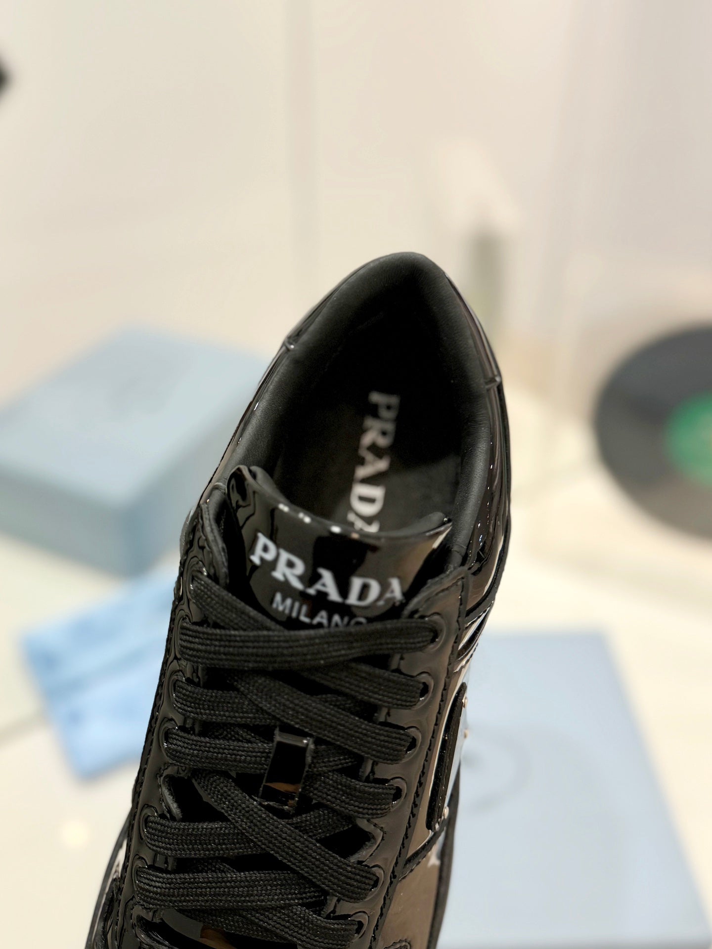 PRADA DOWNTOWN PERFORATED SNEAKERS GLOSSY BLACK CALFSKIN