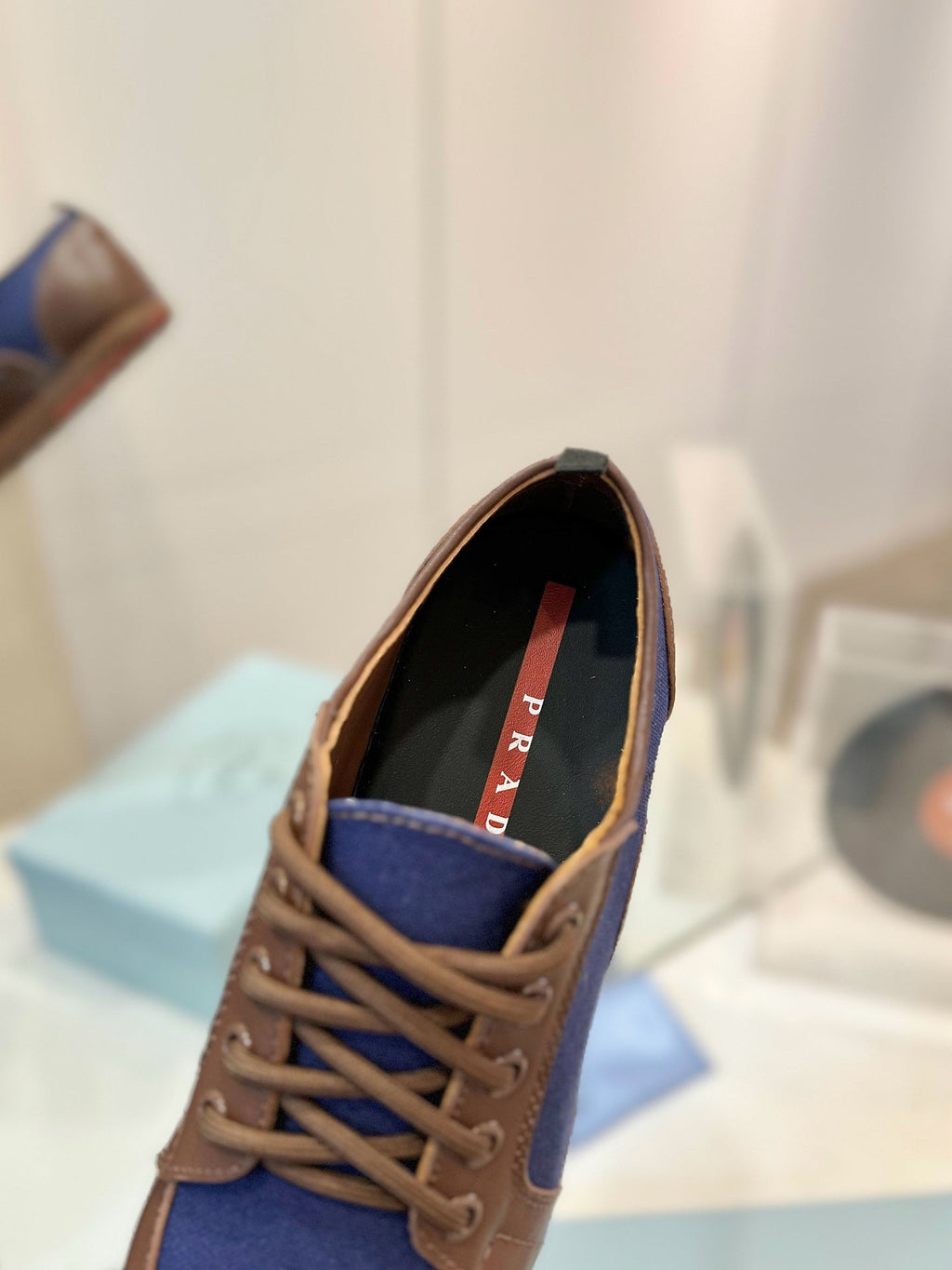 PRADA SNEAKERS IN BROWN LAMBSKIN AND NAVY BLUE CANVAS